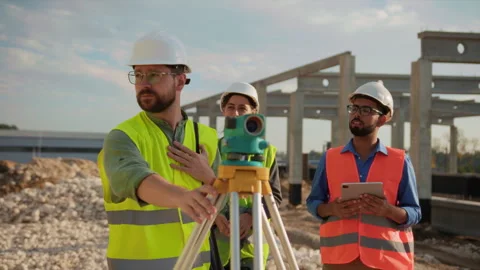 On project engineers with helmet and uniform talking about a construction clap Stock Footage 276910044