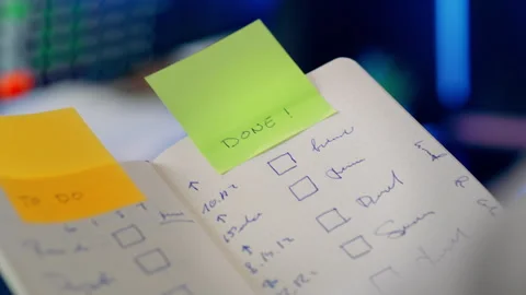 Project management checklist notebook task progress tracking Stock Footage 329663247