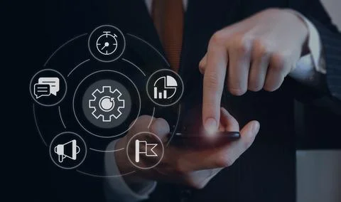 Project management closeup concept image with white glyph icons Stock Photos