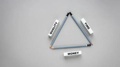 Project management triangle concept made of pencils and white blocks  Stock Photos