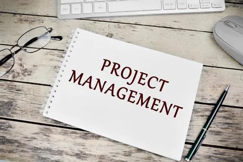 Project management words on notebook Stock Photos