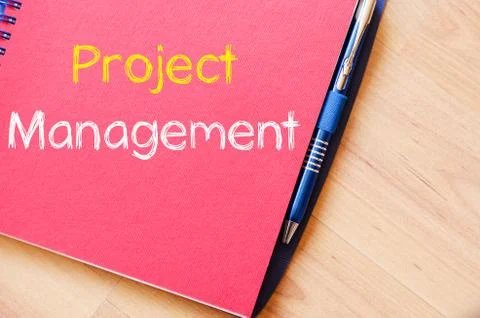 Project management write on notebook Stock Photos