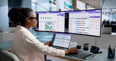 Project Manager Analyzes Software Dashboard To Track Billable Hours Efficient Stock Photos