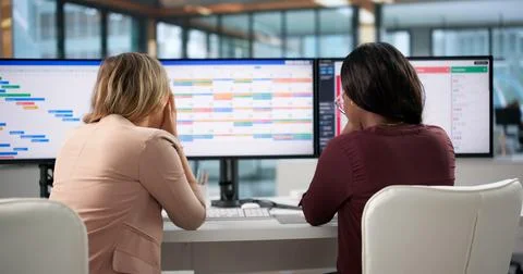 Project Manager And Assistant Review Boring Schedule, Feeling Tired At Work. Stock Photos