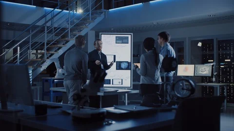 Project Manager Does Motivational Presentation or Team of Electronics Engineers Stock Footage 104661571