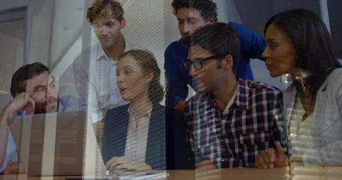 Project manager guiding team around laptop in business office, with animated Stock Footage 308654809