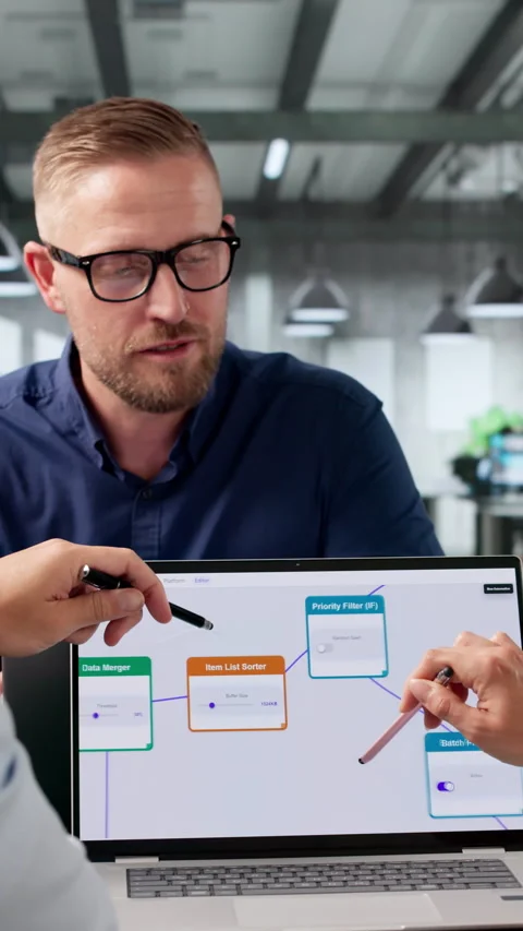 Project Manager Leads Diverse Team Optimizing Automated Workflow Stock Footage 336791382