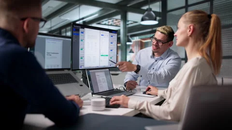 Project Manager Leads Diverse Team Using Software For Document Control Stock Footage 337224265