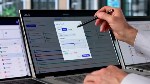 Project Manager Reviews OKR Dashboard Tracking Team Progress Stock Footage 334931447