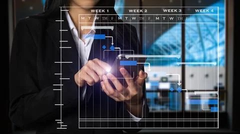 Project manager working and update tasks with milestones progress planning an Stock Photos