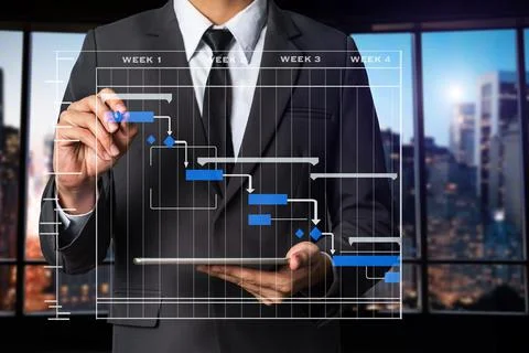 Project manager working and update tasks with milestones progress planning an Stock Photos