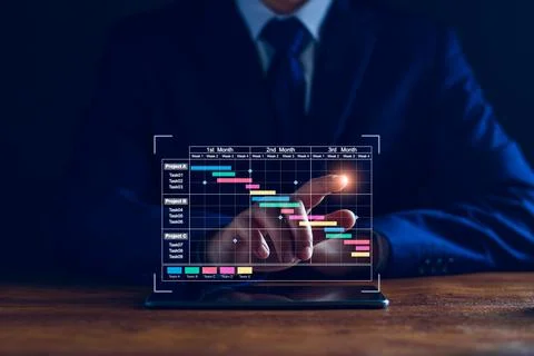 Project manager working on tablet. updating tasks and milestones progress p.. Stock Photos