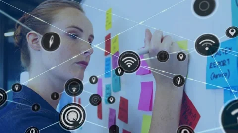 Project manager writing on planning wall, sparking node overlay linking sticky Video stock 332285843
