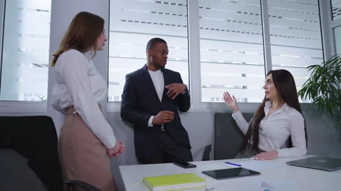 Project managers discussing workflow at meeting Stock Footage 155614413