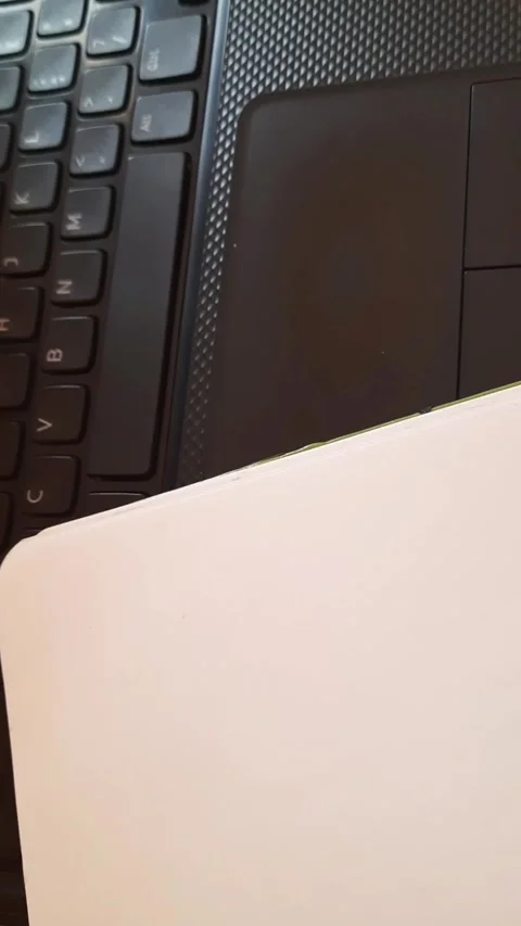 Project Planning and Laptop Workflow with Sticky Note on Notebook Video stock 336854244