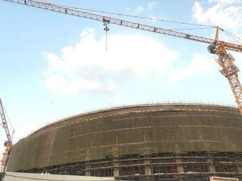 Project Site Construction under progress using tower crane and activities lik Stock Photos