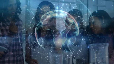 Project team leaning over touchscreen, tapping and amplifying 3D globe for tech Stock Footage 332936490
