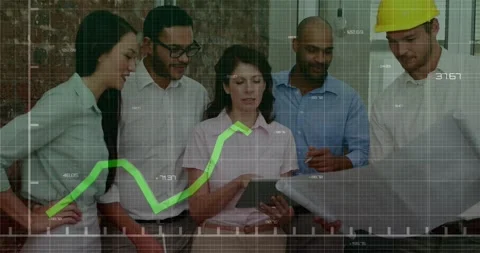 Project team tapping tablet and matching blueprint for review on site while Stock Footage 334034480