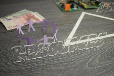 Project triangle - closeup on the resources factor Stock Photos