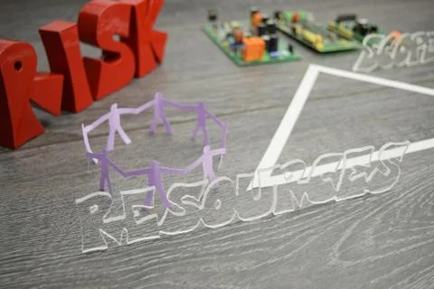 Project triangle - closeup on the resources factor Stock Photos