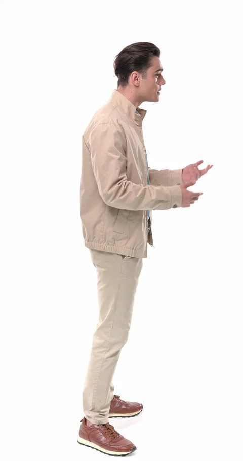 Project video of casual young guy with beige jacket having a heated discussion Stock Footage 304829908