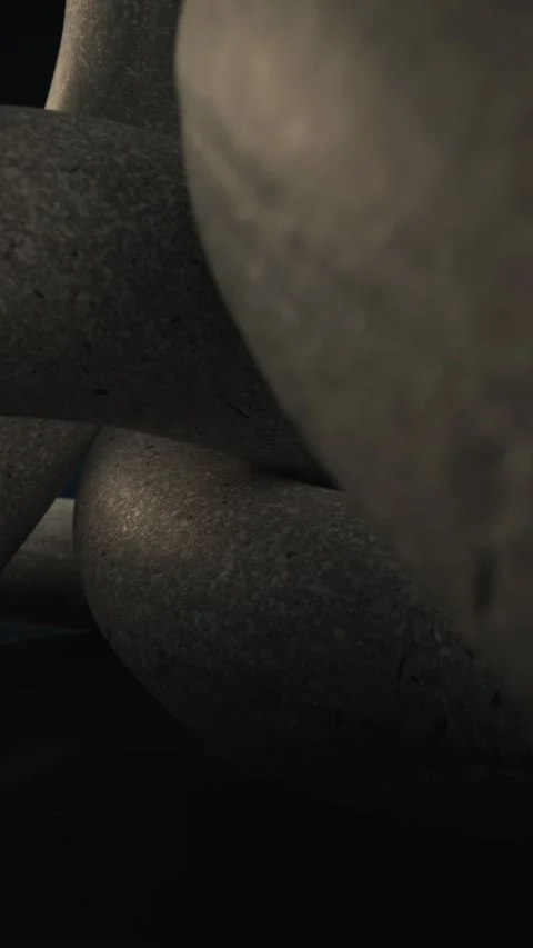Project video of intertwined rings made of stones, concept of unity and Stock Footage 283983064