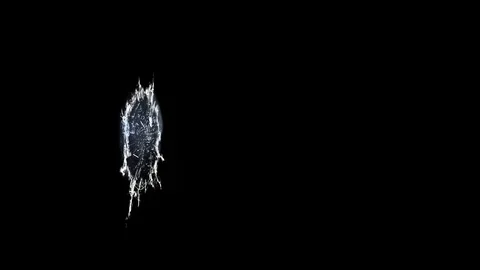 Projectile shattering glass in slow motion. Stock Footage 75941996