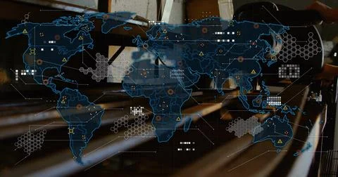Projecting blue world map overlaying benches in conference hall with network Illustrazione stock