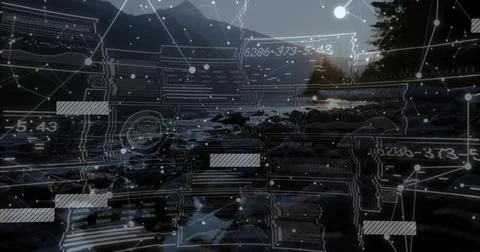 Projecting digital HUD elements across rocky shoreline at dusk, showing tide Stock Photos