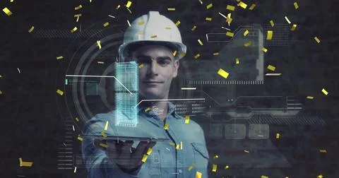 Projecting engineer wearing white safety helmet holding 3D skyscraper in studio Stock Photos