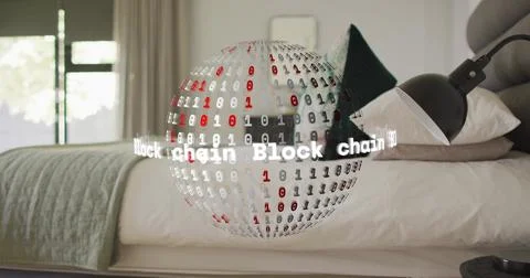 Projecting holographic globe hovering above bed in modern bedroom, with binary Stock Photos