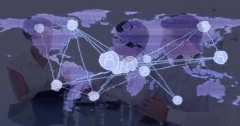 Projecting purple world map and network nodes across meeting table, showing 库存照片