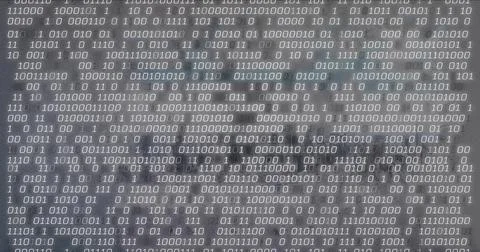 Projecting rows of 0 and 1 across textured gray surface, revealing smudges and Stock Photos
