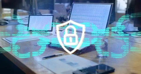 Projecting shield icon and world map data in office with laptop tablet Stock Photos