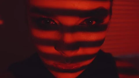 Projection of black and red lines on the girl's face. Stock Footage 99931878