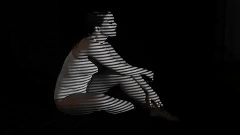 Projection of black and white lines on the girl’s body. Stock Footage 104182621