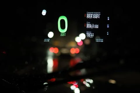 Projection of the navigator on the windshield of the car at night Stock Photos