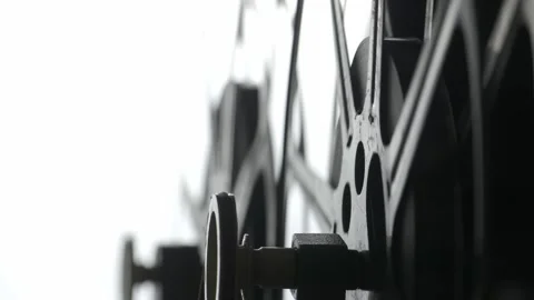 Projector on 16-millimeter film. Close-up. The reels are rotating. Stock Footage 297855152