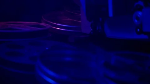 Projector in a dark room, the camera movement. Stock Footage 70842311