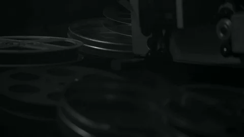 Projector in a dark room, the camera movement Stock Footage 70842385