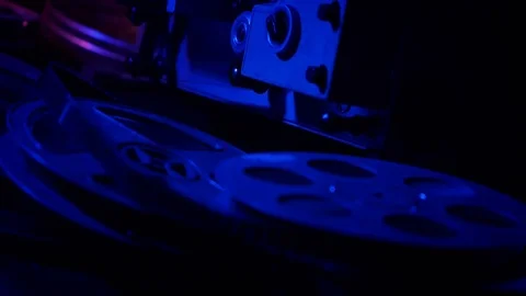 Projector in a dark room, the camera movement. Stock Footage 70842696