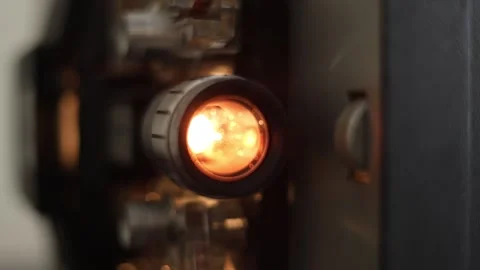 Projector Lamp Through Vintage Super 8MM Projector Stock Footage 337679319