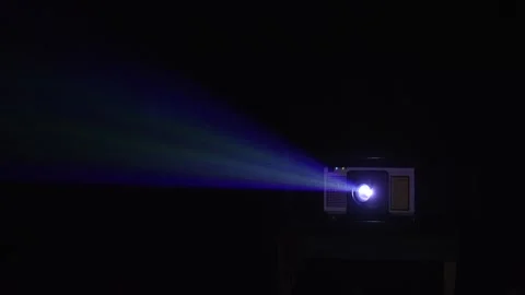 Projector lighting up the dark. Stock Footage 317818141