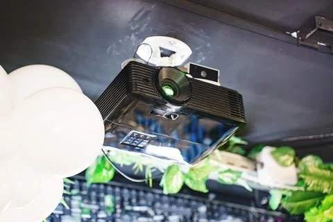Projector mounted on ceiling for presentations and events 写真素材