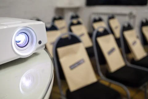 Projector on office table ready for presentation Stock Photos