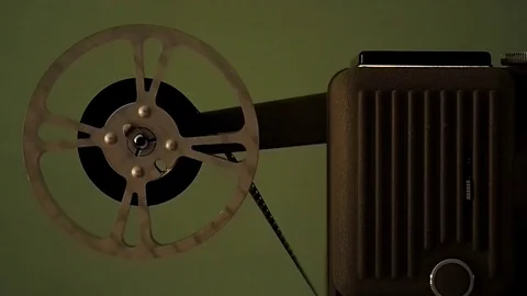 Projector that run an old film in 4k Stock-Footage 73655384