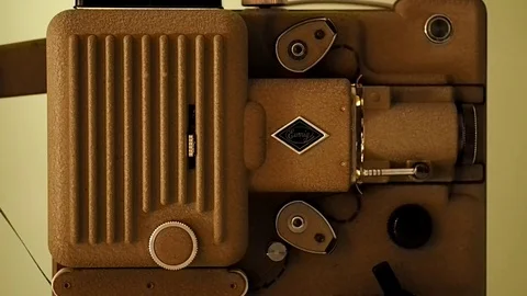 Projector that run an old film in 4k 库存影片 73674433