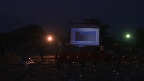 Projector setup for public cinema in an Indian village 動画素材 90856459