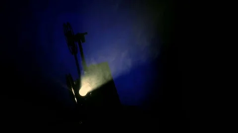 Projector silhouette on a blue background Video stock 70842863