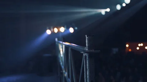 Projectors view to the stage on the background of blur audience. Flashing lights Stock Footage 108306428